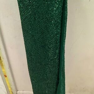 Emerald long sleeveless dress with sparkles